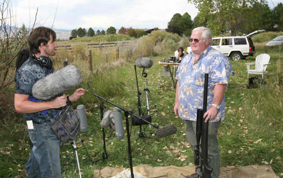 Erik Aadahl talking with retired Colorodo police officer recording weapons for military scenes small