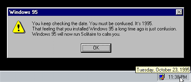 A cursor hovers over the time on a Windows 95 screen, displaying the date as October 23, 1995. An exclamation pops up to say, "You keep checking the date. You must be confused. It's 1995. That feeling that you installed Windows 95 a long time ago is just confusion. Windows 95 will now run Solitaire to calm you." Article written by Adriane Kuzminski.