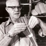 Jimmy MacDonald holding the roll of bamboo that was used to create one of the sound layers for the devastating forest fire in Bambi.