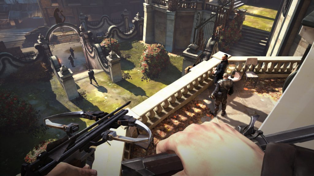 Emily crouches on a platform high above several enemies in a courtyard